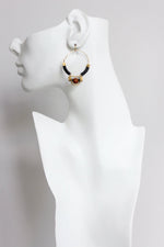 FERE24 Art Deco black and brown hoop earrings